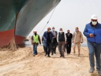 Tug Boats, Dredgers, Heavy Machinery Work to Free Suez Canal Ship