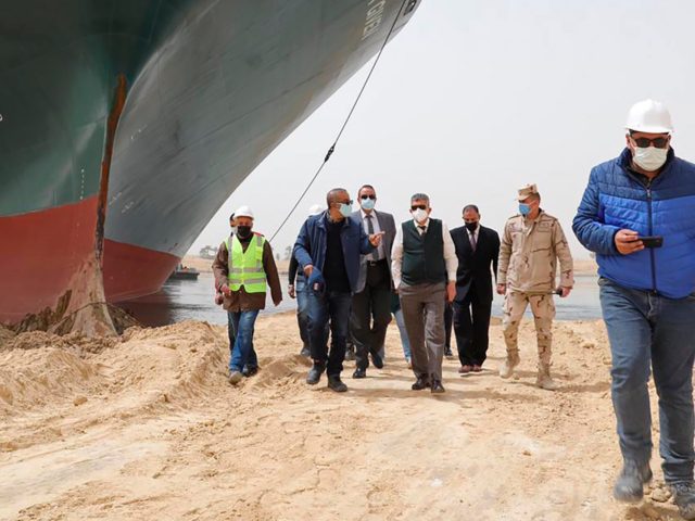 This photo released by the Suez Canal Authority on Thursday, March 25, 2021, shows Lt. Gen