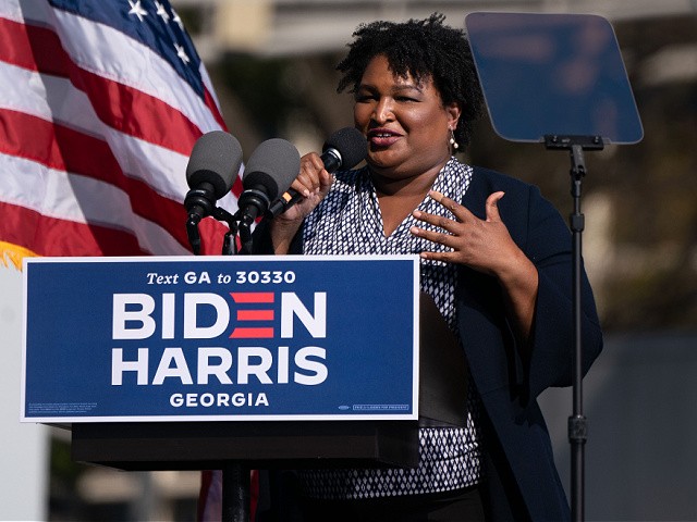 Former US Representative and voting rights activist Stacey Abrams speaks at a Get Out the Vote rally with former US President Barack Obama as he campaigns for Democratic presidential candidate former Vice President Joe Biden on November 2, 2020, in Atlanta, Georgia. (Photo by Elijah Nouvelage / AFP) (Photo by ELIJAH NOUVELAGE/AFP via Getty Images)