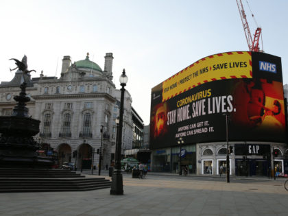 The government's advice to combat the coronavirus epidemic is displayed on the advertising boards at Piccadilly Circus in central London on April 9, 2020, as Britain continues to battle the outbreak of Coronavirus Covid-19 and warm weather tests the nationwide lockdown as the long Easter weekend approaches. - The disease …