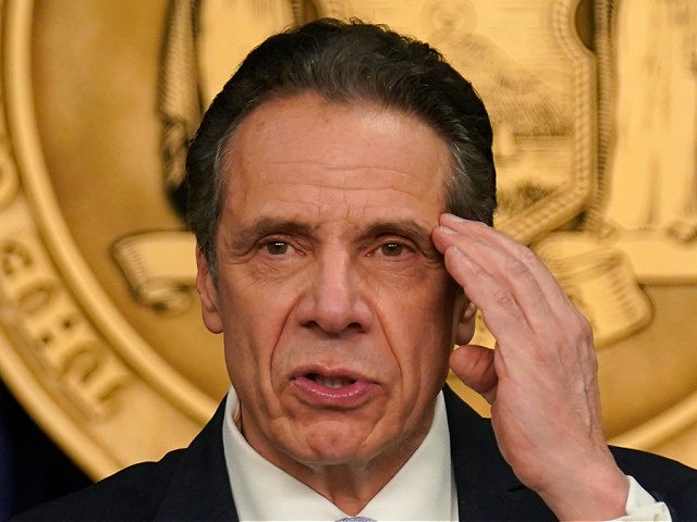 New York Governor Andrew Cuomo speaks at an event at his office in New York, on March 18, 2021. - Cuomo spoke about the return of spectators to performing arts and sporting events, including a limited amount of fans attending baseball games at the start of the season as the …