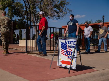 People wait in line to vote in front of a polling station at St. Andrew the Apostle Parish in Sierra Vista, Arizona on November 3, 2020. - The United States started voting Tuesday in an election amounting to a referendum on Donald Trump's uniquely brash and bruising presidency, which Democratic …