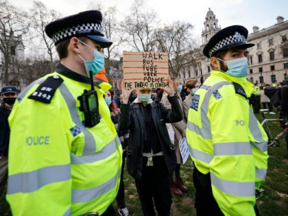 Protestors assemble in Parliament Square to demonstrate against Government's Police, Crime, Sentencing and Courts Bill, being debated in Parliament in London on March 15, 2021. (Photo by Tolga Akmen / AFP) (Photo by TOLGA AKMEN/AFP via Getty Images)