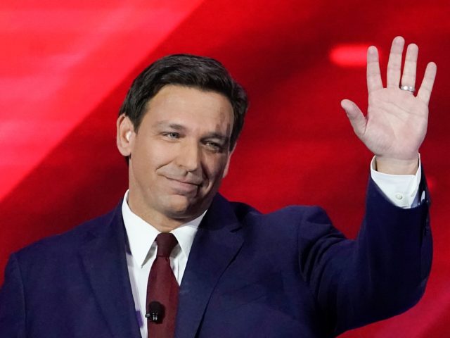 Florida Gov. Ron DeSantis waves as he is introduced at the Conservative Political Action Conference (CPAC) Friday, Feb. 26, 2021, in Orlando, Fla. (AP Photo/John Raoux)