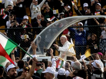 ERBIL, IRAQ - MARCH 07: (EDITORS NOTE: Transmitted with alternate crop) Pope Francis waves