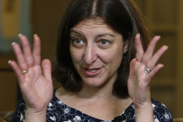 Rep. Elaine Luria, D-Va., gestures during an interview in her home in Norfolk, Va., Thursd