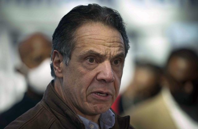 Cuomo Sexual Harassment This Monday, March 8, 2021, file photo shows New York Gov. Andrew Cuomo speaking at a vaccination site in New York. A sixth woman has come forward alleging that Cuomo inappropriately touched her late last year, during an encounter at the governor's mansion. (AP Photo/Seth Wenig, Pool, File)