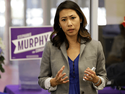 In this photo taken Oct. 18, 2016, Florida Democratic Congressional candidate Stephanie Murphy meets with voters at a senior center in Altamonte Springs, Fla. Rep. John Mica, R-Fla., is seeking a 13th term in Congress from central Florida, but it’s not an easy path. The veteran Republican tells supporters turnout …