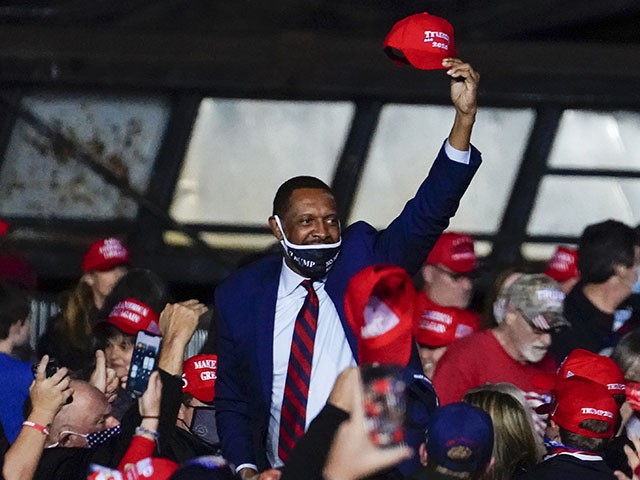 State Rep. Vernon Jones walks through the crowd before President Donald Trump arrives to speak at a campaign rally on Sunday, Nov. 1, 2020, at Richard B. Russell Airport in Rome, Ga. (AP Photo/Brynn Anderson)