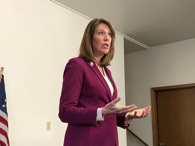 In this Saturday, Dec. 21, 2019, file photo, Rep. Cindy Axne, D-Iowa., speaks to constituents about her vote on the USMCA trade deal in Guthrie Center, Iowa. Axne is running for reelection on Nov. 3, 2020. (AP Photo/Alexandra Jaffe, File)