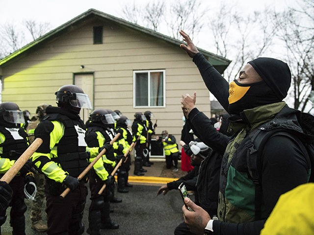 Protestors and Police Officers clash outside the Brooklyn Center Police Department on April 12, 2021 in Brooklyn Center, Minnesota after the killing of Daunte Wright. Photo: Chris Tuite/ImageSPACE /MediaPunch /IPX