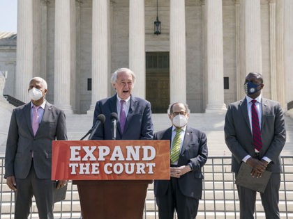 From left, Rep. Hank Johnson, D-Ga., Sen. Ed Markey, D-Mass., House Judiciary Committee Chairman Jerrold Nadler, D-N.Y., and Rep. Mondaire Jones, D-N.Y., hold a news conference outside the Supreme Court to announce legislation to expand the number of seats on the high court, on Capitol Hill in Washington, Thursday, April …
