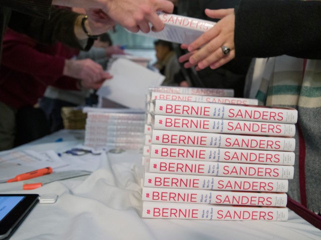 Attendees receive a copy of Sen. Bernie Sanders', I-Vt., new book, 'Where We Go