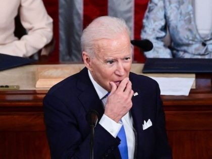 US President Joe Biden addresses a joint session of Congress as US Vice President Kamala Harris and US Speaker of the House Nancy Pelosi listen at the US Capitol in Washington, DC, on April 28, 2021. (Photo by JIM WATSON / POOL / AFP) (Photo by JIM WATSON/POOL/AFP via Getty …