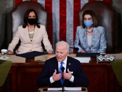 WASHINGTON, DC - APRIL 28: U.S. President Joe Biden addresses a joint session of congress as Vice President Kamala Harris (L) and Speaker of the House U.S. Rep. Nancy Pelosi (D-CA) (R) look on in the House chamber of the U.S. Capitol on April 28, 2021 in Washington, DC. On …
