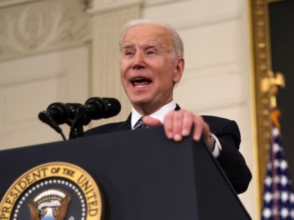 U.S. President Joe Biden delivers remarks on the state of vaccinations at the State Dining