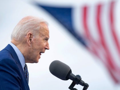 US President Joe Biden speaks during a drive-in rally at Infinite Energy Center April 29,