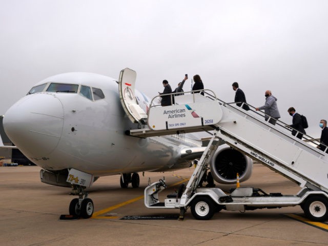 Invited passengers board an American Airlines Boeing 737 Max jet before departing from Dal