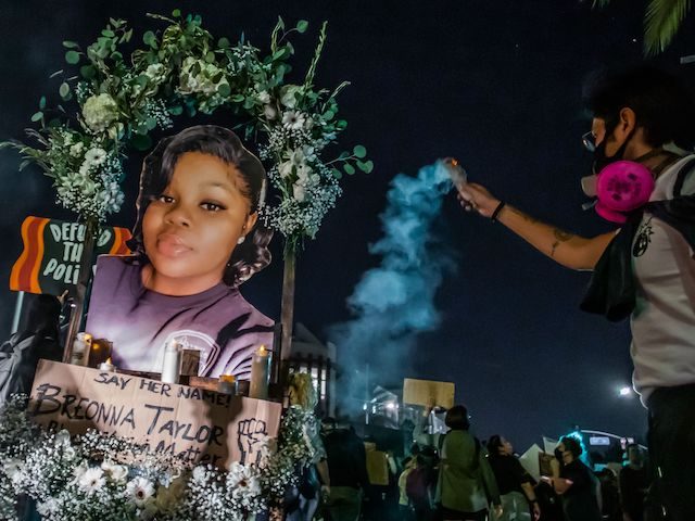 Protesters march against police brutality in Los Angeles, on September 23, 2020, following a decision on the Breonna Taylor case in Louisville, Kentucky. - A judge announced charges brought by a grand jury against Detective Brett Hankison, one of three police officers involved in the fatal shooting of Taylor in …