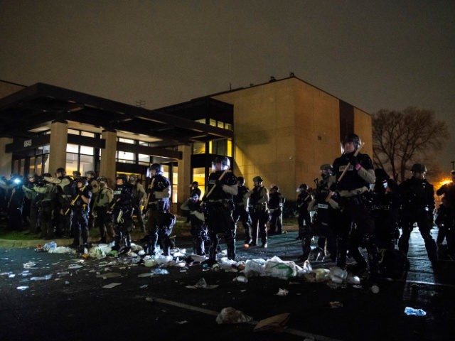 Protestors and City of Brooklyn Center Police Officers clash outside the Brooklyn Center Police Department on April 11, 2021 in Brooklyn Center, Minnesota after the killing of Daunte Wright. Photo: Chris Tuite/ImageSPACE /MediaPunch /IPX via AP