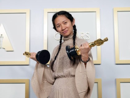 LOS ANGELES, CALIFORNIA – APRIL 25: (EDITORIAL USE ONLY) In this handout photo provided by A.M.P.A.S., Chloé Zhao, winner of the Best Director for 'Nomadland,' poses in the press room during the 93rd Annual Academy Awards at Union Station on April 25, 2021 in Los Angeles, California. (Photo by Matt …