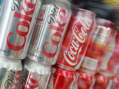 Cans of Sprite, Diet Coke and Coca-Cola are offered for sale at a grocery store on April 1