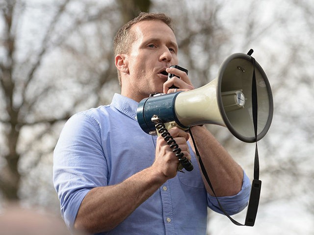 UNIVERSITY CITY, MO - FEBRUARY 22: Missouri Governor Eric Greitens addresses the crowd at Chesed Shel Emeth Cemetery on February 22, 2017 in University City, Missouri. Greitens and US Vice President Mike Pence were on hand to speak to over 300 volunteers who helped cleanup after the recent vandalism. Since …