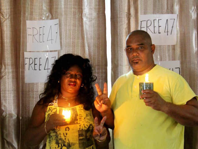Berta Soler of the Ladies in White and former political prisoner Angel Moya conduct a home vigil in Cuba for 47 Hong Kong political prisoners, April 15, 2021
