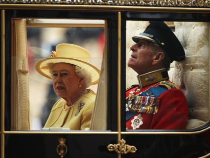 LONDON, ENGLAND - APRIL 29: Queen Elizabeth II Prince Philip, Duke of Edinburgh ride in a carriage procession to Buckingham Palace following the marriage of Their Royal Highnesses Prince William Duke of Cambridge and Catherine Duchess of Cambridge at Westminster Abbey on April 29, 2011 in London, England. The marriage …