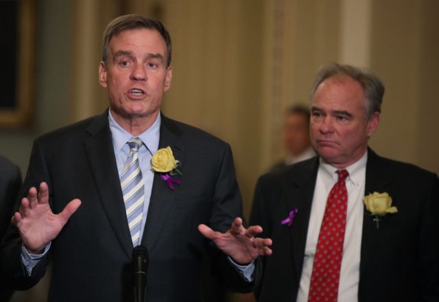 WASHINGTON, DC - JUNE 04: Sen. Mark Warner (D-VA) (L) and Sen. Tim Kaine (D-VA) speak about gun control and the recent Virginia Beach shooting after attending the Senate Democrats weekly policy luncheon on Capitol Hill June 4, 2019 in Washington, DC. (Photo by Mark Wilson/Getty Images)