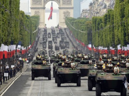 French soldiers parade in military vehicles during the Bastille Day military parade down the Champs-Elysees avenue in Paris on July 14, 2019. (Photo by Lionel BONAVENTURE / AFP) (Photo credit should read LIONEL BONAVENTURE/AFP via Getty Images)