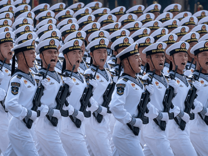 Chinese navy sailors march in formation during a parade to celebrate the 70th Anniversary of the founding of the People's Republic of China at Tiananmen Square in 1949, on October 1, 2019 in Beijing, China. (Photo by Kevin Frayer/Getty Images)