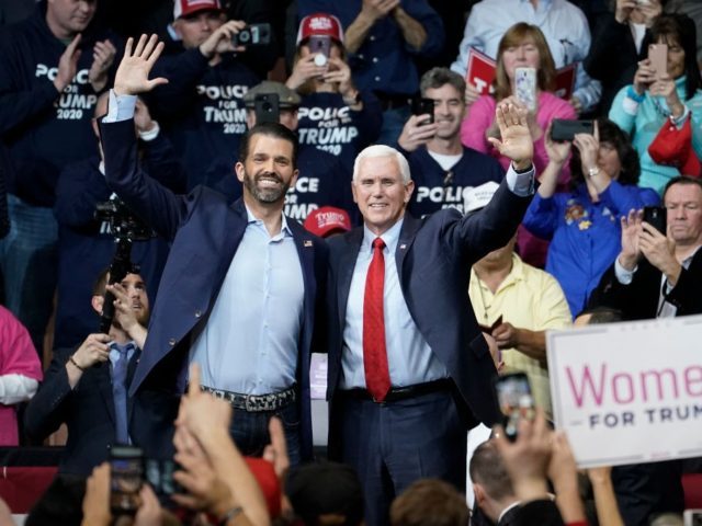MANCHESTER, NH - FEBRUARY 10: (L-R) Donald Trump Jr. and Vice President Mike Pence wave to