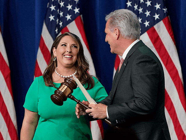 Republican National Committee Chairwoman, Ronna McDaniel, hands the gavel to House Minority Leader Kevin McCarthy of Calif., before he speaks on the first day of the Republican National Convention at the Charlotte Convention Center on August 24, 2020 in Charlotte, North Carolina. The four-day event is themed "Honoring the Great …