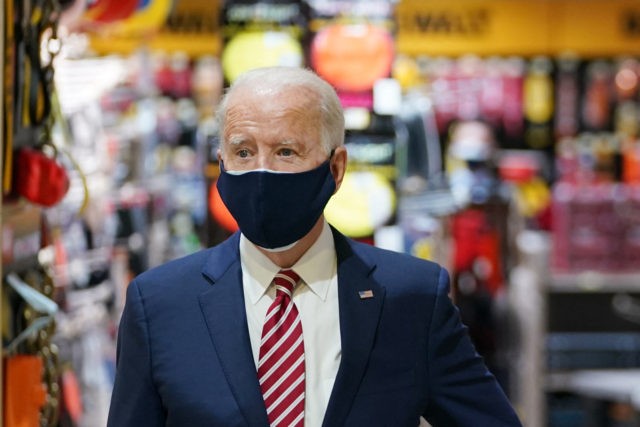 US President Joe Biden visits W.S. Jenks & Son, a hardware store that has benefited from a Paycheck Protection Program (PPP) loan, in Washington, DC, on March 9, 2021. (Photo by MANDEL NGAN / AFP) (Photo by MANDEL NGAN/AFP via Getty Images)