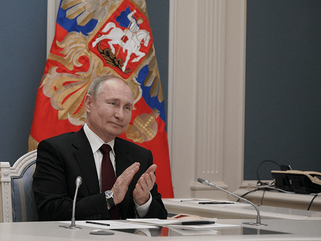 Russian President Vladimir Putin participates via video link in a ceremony launching a gol