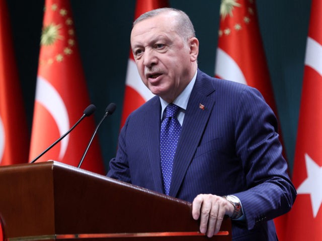 Turkish President Recep Tayyip Erdogan delivers a speech following an evaluation meeting at the Presidential Complex in Ankara on April 5, 2021. - Erdogan on April 5, 2021, accused dozens of retired admirals of eyeing a "political coup" by attacking his plans for a canal linking the Black Sea to …
