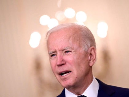 US President Joe Biden delivers remarks on Russia at the East Room of White House in Washington, DC on April 15, 2021. - The United States announced sanctions and the expulsion of 10 Russian diplomats Thursday in retaliation for what Washington says is the Kremlin's US election interference, a massive …