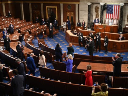 WASHINGTON, DC - APRIL 28: Members of Congress applaud as U.S. Vice President Kamala Harri