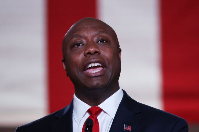WASHINGTON, DC - AUGUST 24: U.S. Sen. Tim Scott (R-SC) stands on stage in an empty Mellon Auditorium while addressing the Republican National Convention at the Mellon Auditorium on August 24, 2020 in Washington, DC. The novel coronavirus pandemic has forced the Republican Party to move away from an in-person …