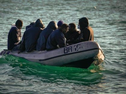 DOVER, ENGLAND - SEPTEMBER 06: Nine migrants drift in the English Channel after their engi