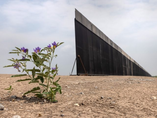 LA JOYA, TEXAS - APRIL 14: A portion of U.S.-Mexico border wall stands unfinished on April 14, 2021 near La Joya, Texas. President Joe Biden paused wall construction by executive order upon taking office in January, 2021. The administration has reportedly decided to possibly finish wall construction on gaps where …