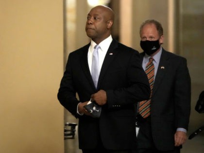 WASHINGTON, DC - APRIL 28: Sen. Tim Scott (R-SC) walks through the U.S. Capitol before he delivers the Republican response to President Biden's address to Congress April 28, 2021, in Washington, DC. On the eve of his 100th day in office, Biden spoke about his plan to revive America’s economy …