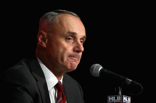 TORONTO, ON - OCTOBER 04: Commissioner of Baseball Rob Manfred reacts during a press conference prior to the American League Wild Card game between the Toronto Blue Jays and the Baltimore Orioles at Rogers Centre on October 4, 2016 in Toronto, Canada. (Photo by Tom Szczerbowski/Getty Images)