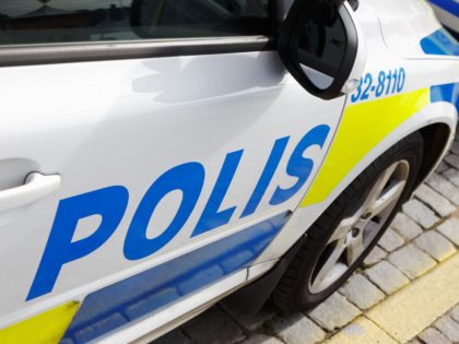 Close-up of the right side of a Swedish police car.