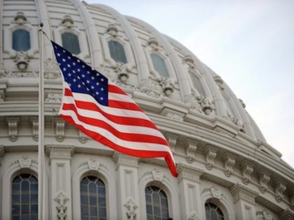 The US flag flies at the US Capitol in Washington, DC, January 20, 2009. Millions of people are expected to be in the US capital to witness the swearing of Barack Obama as 44th President of the United States. AFP PHOTO/Stan HONDA (STAN HONDA/AFP/Getty Images)