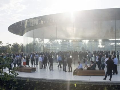People gather at Apple's new headquarters ahead of a media event where Apple is expected to announce a new iPhone and other products in Cupertino, California, on September 12, 2017. (Photo by Josh Edelson / AFP) (Photo credit should read JOSH EDELSON/AFP via Getty Images)