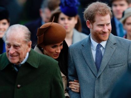 (L-R) Britain's Prince Philip, Duke of Edinburgh, US actress and fiancee of Britain's Prince Harry Meghan Markle and Britain's Prince Harry arrive to attend the Royal Family's traditional Christmas Day church service at St Mary Magdalene Church in Sandringham, Norfolk, eastern England, on December 25, 2017. / AFP PHOTO / …