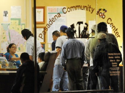 Job seekers line up before dawn to register at a community employment center, on October 2, 2009 in Pasadena, California. According to figures released by the US Labor Department October 2, the national unemployment rate rose to 9.8 percent in September, the highest since June 1983, as employers cut far …