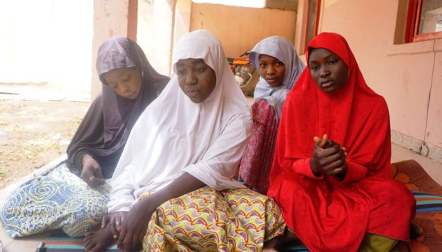 (From left) Fatima Abdu, 14, Zahra Bukar, 13, Fatima Bukar, 13 and Yagana Mustapha, 15, four schoolgirls of Government Girls Technical College, who escaped from Boko Haram attack, sit at home of schoolmate at Dapchi town in northern Nigerian on February 28, 2018. Nigeria's government on March 1 said it …